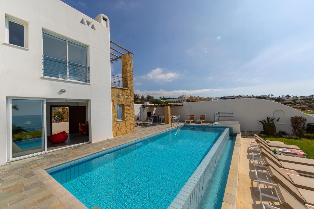 Blue Coral Beach Villas: Exclusive Oceanfront Retreat Coral Bay Exterior photo