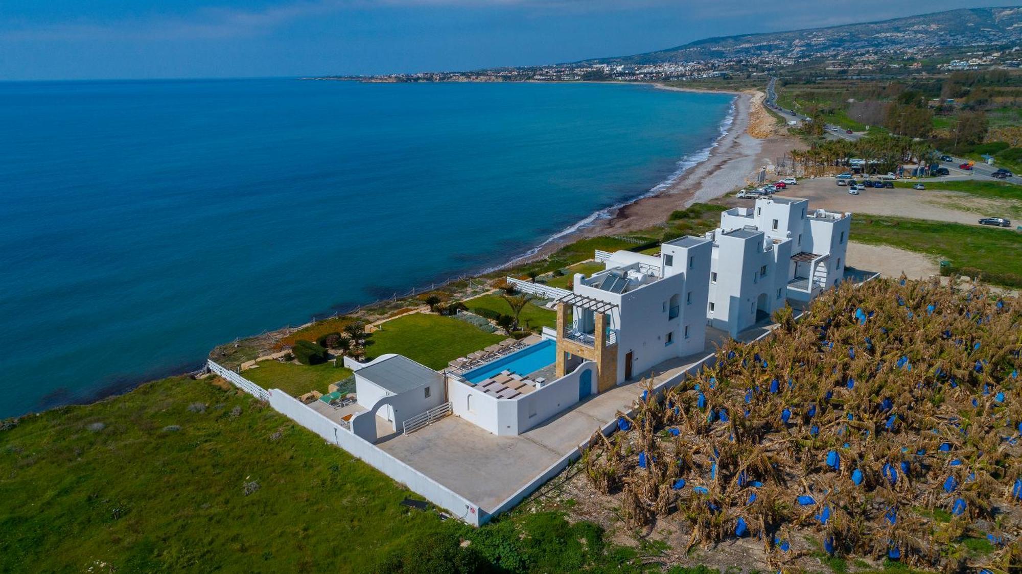 Blue Coral Beach Villas: Exclusive Oceanfront Retreat Coral Bay Exterior photo
